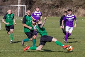 AFC Hilsea (purple) v Saturn Royale. Picture: Mike Cooter