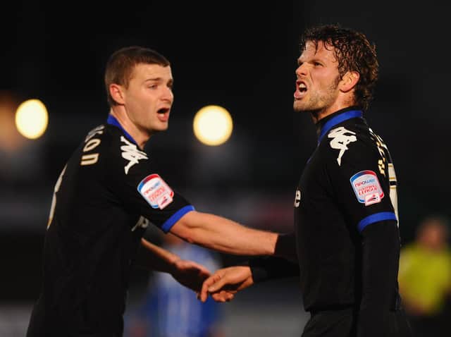 Carl Dickinson with Pompey team-mate Herman Hreidarsson against Brighton in January 2011. The on-loan Stoke defender had two Fratton Park loan spells. Picture: Mike Hewitt/Getty Images