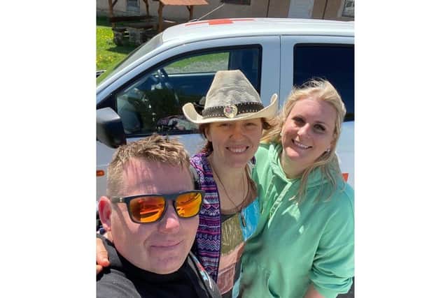 Bridge to Unity makes a trip to deliver supplies to Ukraine. Matt Simmons with Tanya who provided the team a place to stay in Ukraine and volunteer Hannah Jarvis.