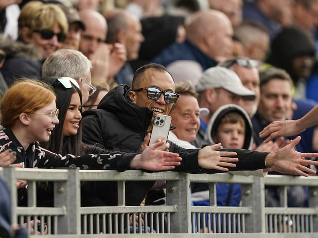 Pompey fans played a big role in carrying their team to a massive three points in their Championship survival battle against Blackburn Rovers.