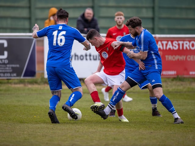 Action from Gosport Town's 4-0 victory over Lee Rangers (blue kit) in the Portsmouth & District FA Trophy final at Cams Alders. Picture: Alex Shute