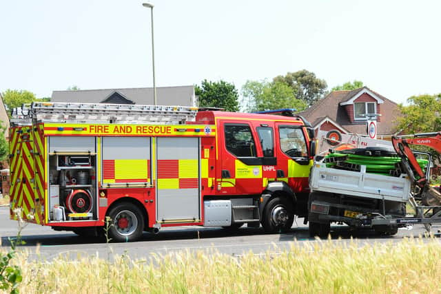 A road traffic collision involving a fire engine and a white Isuzu Grafter tipper truck at the junction of Park Lane and Hulbert Road in Havant. Picture: Sarah Standing (160623-8569).