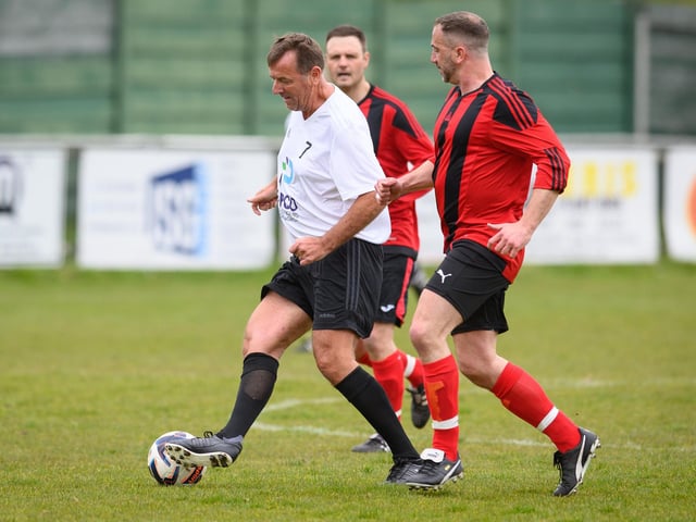 Action from the Jon Gittens memorial charity match between a team of former Fareham Town players and a side of ex-Pompey and Southampton professionals. Picture: Keith Woodland (160421-279)