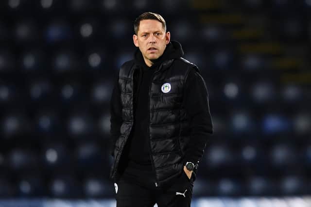 Wigan fans have been calling for the dismissal of former Pompey coach Leam Richardson after their defeat to Coventry on Tuesday.