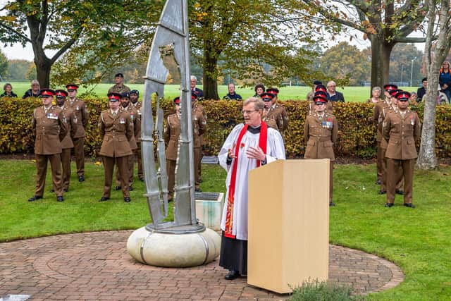 The Reverend Andrew Sheard (Rector of Warblington and Emsworth) at the Emsworth remembrance service with members of the 16 Regiment Royal Artillery from Thorney Island. Picture: Mike Cooter (111121)