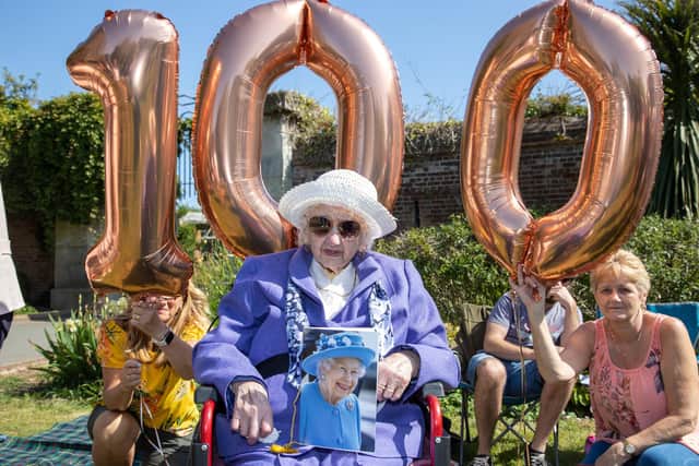 Portsmouth resident Dorothy Crook marked her 100th Birthday on Sunday afternoon with a huge family gathering at Canoe Lake in Southsea.Pictured - Dorothy Crook, 100, with her letter from the Queen.Pictures by Alex Shute