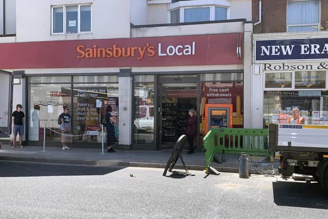Roadworks to install fast internet in Portsmouth. People queuing outside Sainsbury's in Albert Road. Picture: Ben Fishwick.