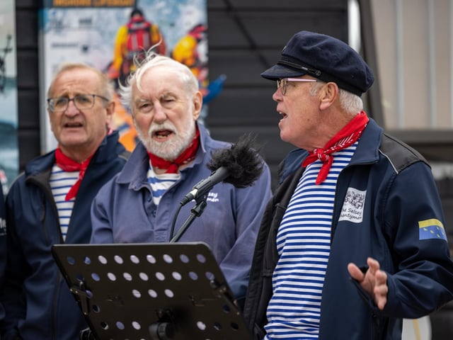 The Selsey Shantymen performing during the open day at Langstone Harbour. Picture: Mike Cooter (310824)