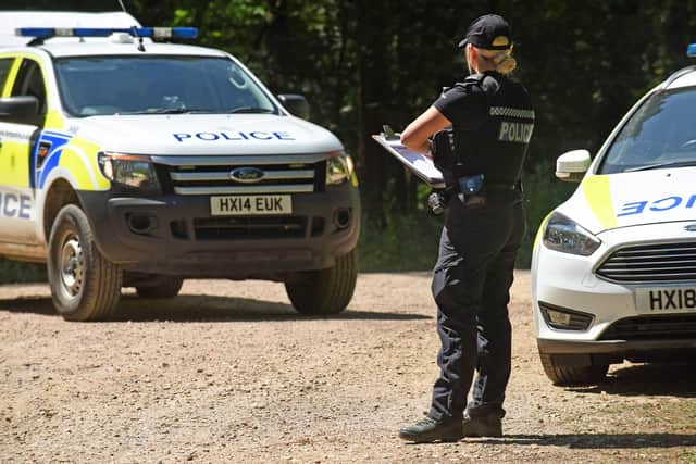 Police at the scene of Havant Thicket where the body of Louise Smith was found. Picture: Simon Czapp/Solent News & Photo Agency