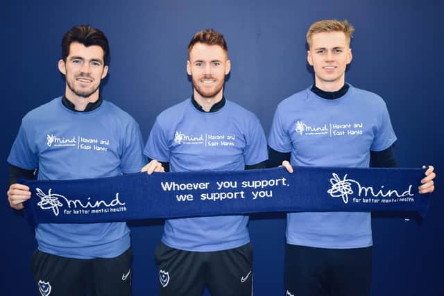 Portsmouth FC players Tom Naylor, John Marquis and Keeper Alex Bass