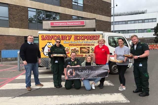 Staff from Queen Alexandra Hospital and Savoury Express at a birthday celebrations held for Captain Tom Moore