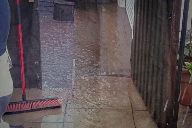The back of Simon's home when it was flooded. Picture: Habibur Rahman
