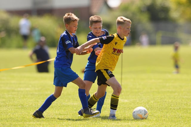 Action from the Clanfield youth football tournament at Horndean Technology College. Picture: Keith Woodland (270521-474)