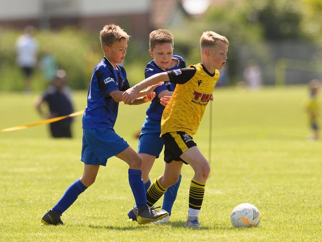 Action from the Clanfield youth football tournament at Horndean Technology College. Picture: Keith Woodland (270521-474)