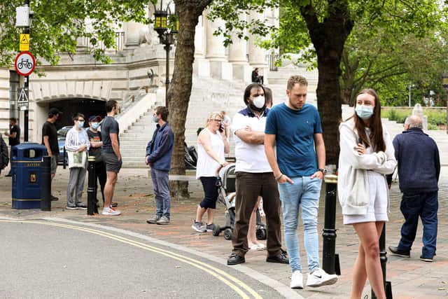 The queue at the Covid-19 Vaccination Centre at Lalys Pharmacy, Guildhall Walk, PortsmouthPicture: Chris Moorhouse (jpns 100621-02)