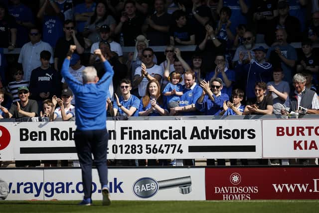Barry Harris gees up the crowd before Pompey's clash at Burton last season. Picture: Daniel Chesterton/phcimages.com/PinPep