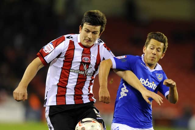 Jon Harley, pictured battling with then Sheffield United defender Harry Maguire, has returned to Fratton Park after 10 years away. Picture: Allan Hutchings