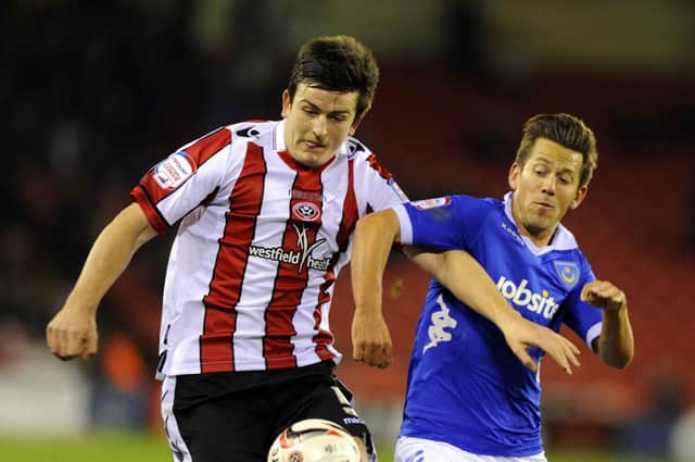 Jon Harley, pictured battling with then Sheffield United defender Harry Maguire, has returned to Fratton Park after 10 years away. Picture: Allan Hutchings