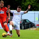 Portchester's Sam Pearce, left, in action against Gosport Borough in last weekend's Ray Stainton/Steve Woods Memorial Cup tie at Privett Park. Picture: Tom Phillips.