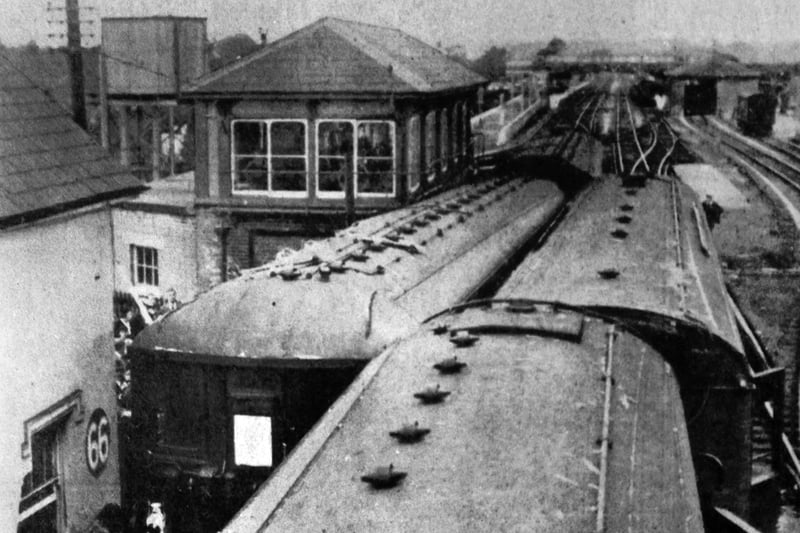 Train crash, a side-swipe collision at Havant 1939.
Looking down on the roofs of the down Brighton, left and the down Waterloo, right after coming to a  stand alongside Havant signal box