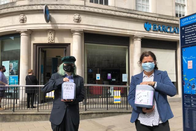 Activists from Extinction Rebellion targeted Barclays and HSBC branches in Commercial Road. Picture: Richard Lemmer