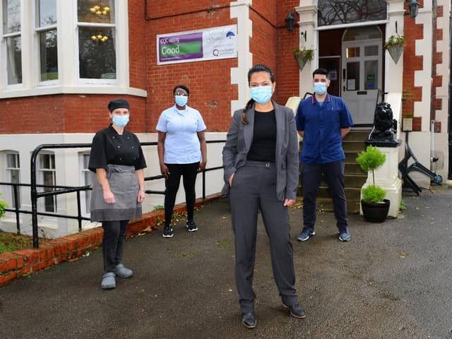Oakland Grange Care Home in Merton Road, Southsea. 

Pictured is: (l-r) Isadora Esmeraldo, chef, Linda Otieno, care assistant, Charisma Williams, care home manager, and Fabio Freitas, senior carer, at Oakland Grange Care Home.

Picture: Sarah Standing (111220-339)