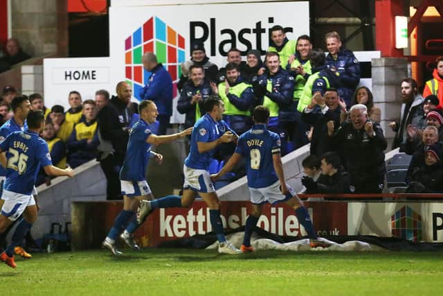Michael Doyle and his team-mates celebrate his sensational strike in the 3-1 victory at Accrington in March 2016. Picture: Joe Pepler