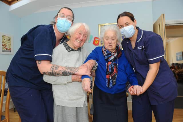 Portsmouth's oldest identical twins celebrated their 93rd birthday on Monday, April 18 at Braemar Care Home in Southsea.

Pictured is: (left and right) Senior carers Amy Saunders and Joanne Woodacre with identical twins (middle l-r) Barbara Walford and Beryl Taylor.

Picture: Sarah Standing (220422-2197)