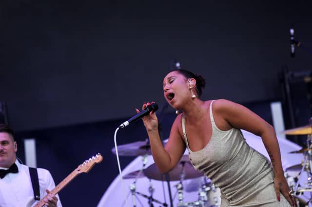 Raye performing on the Common Stage on Friday, August 25.
