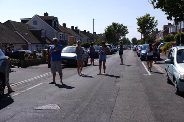 Residents on Woodfield Avenue in Farlington celebrate the anniversary of VE Day while maintaining social distancing.