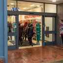 Tim Benham (Store Manager) opens the new Poundland store in West Street, Fareham. Picture: Mike Cooter (091223)