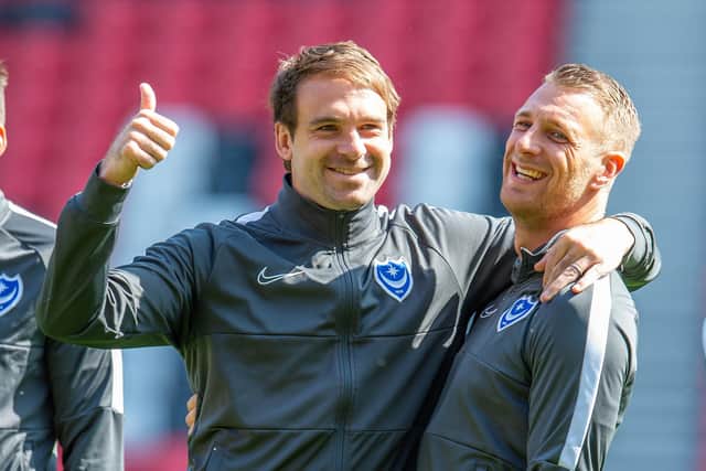 Brett Pitman jokes with Pompey team-mate Lee Brown. Picture: Malcolm Mackenzie/ProSportsImage