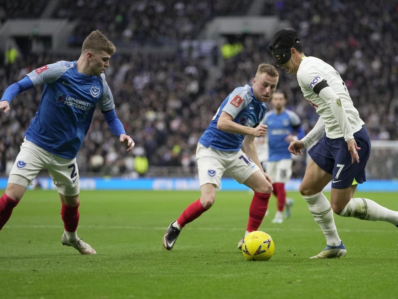 Tottenham's Son Heung-min is challenged by Joe Morrell and Zak Swanson. Picture: AP Photo/Kin Cheung