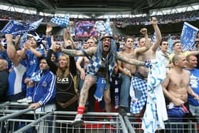 Pompey and Cardiff's record Wembley crowd remained unscathed in yesterday's FA Cup final between Liverpool and Chelsea.   Picture: Lewis Whyld