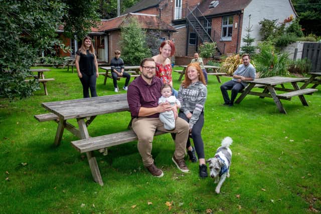 Oliver and Sara Pollard-Dambach  have taken over the Roebuck pub, Wickham on 28 August 2020.Pictured:  Oliver and Sara Pollard-Dambach with their children, Chloe-Louise and Oliva-Rose 17 weeks and their staff. Picture: Habibur Rahman