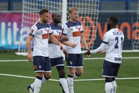 Bedsente Gomis, centre, gets the winner against Cray Valley PM. Picture: Dave Haines