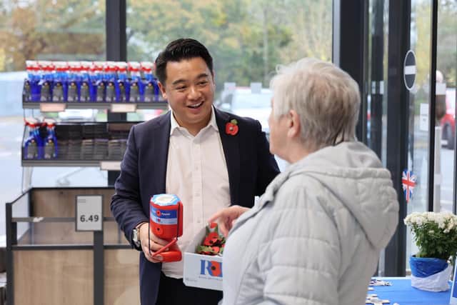 Alan Mak MP selling poppies at Lidl in Manor Road, Hayling Island
