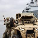 Pictured: Royal Marines from HMS Albion, take part in a display with their Dutch counterparts. They are pictured here using Polaris MRZR-D4 Ultralight Combat and Tactical Support Vehicles. An agile, high-speed vehicle designed for smaller teams to get across the battlefield. Picture: PO Phot Arron Hoare/Royal Navy.