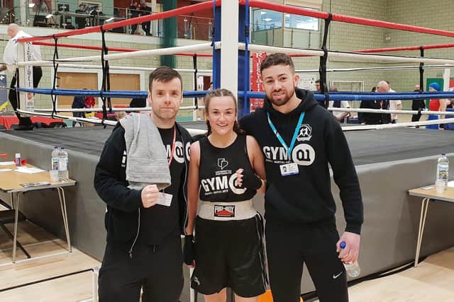 University of Portsmouth student, Lucy Ward, 22, alongside coaches, James Connor (left) and Andrew Moore.