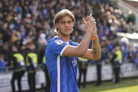 Pompey boss John Mousinho has stated he’s not considering a loan exit for Ryley Towler at present. 