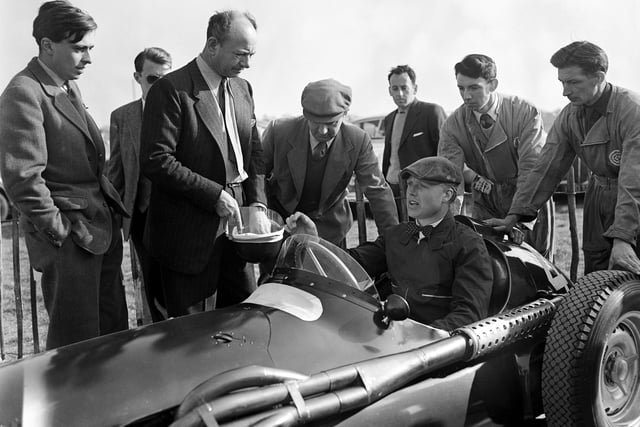 Mike Hawthorn and Raymond Mays at Goodwood, April 1956. (Photo by Central Press/Hulton Archive/Getty Images)
