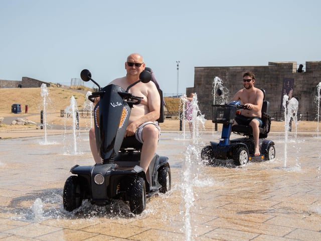 John Millington and Shane Davis at the fountain near Southsea Castle, Portsmouth in July last year - a perfect place to cool down and have some fun
Picture: Habibur Rahman