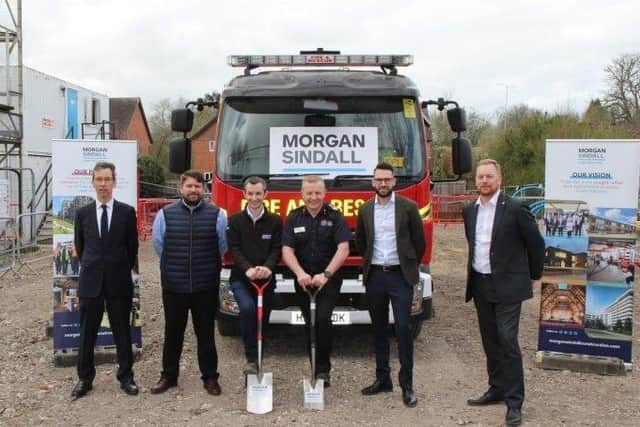 Firefighters, construction workers and invited guests gathered to mark the next phase in the building of Bishops Waltham Fire Station on Tuesday (5 April).