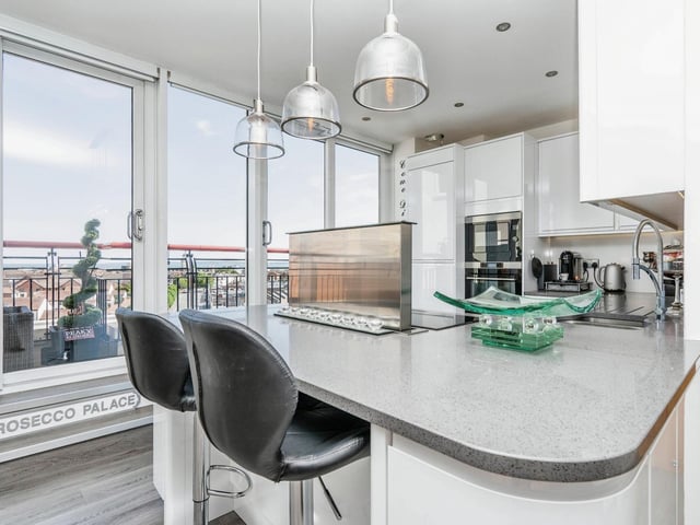The kitchen is modern and stylish throughout and has beautiful views of the city outside.