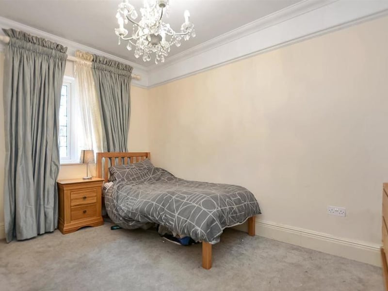 Like all the rooms in the house, this bedroom is full of character. There is a television point, power points and ample room for storage.