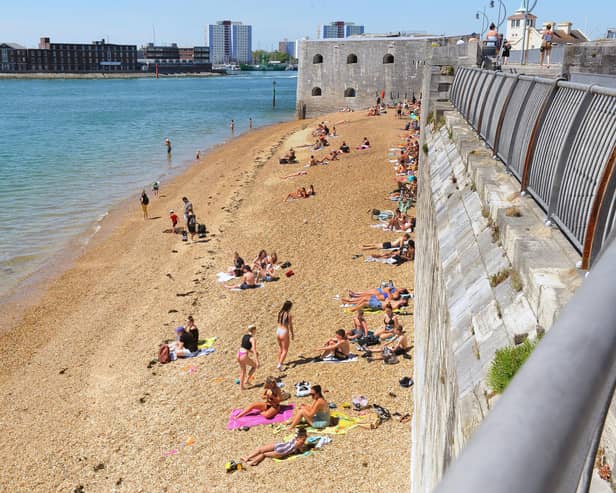 The Hot Walls in Old Portsmouth last month during the fine weather leading up to the second May bank holiday 
Picture: Sarah Standing (210520-8798)