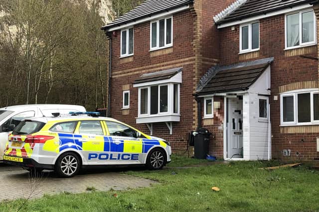 Police outside one of the homes in Meadowsweet Way, in Wymering, where a party descended into violence. Photo: Tom Cotterill