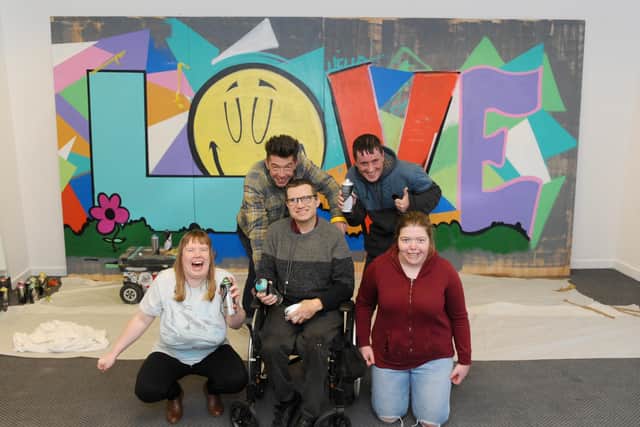 Portsmouth artist 'Fark' with members of Love4Life Tasha Lane (28), Leon Powell (46), Sam Knight (31) and Taylor Sambrook (26). Picture: Sarah Standing (090320-6742)