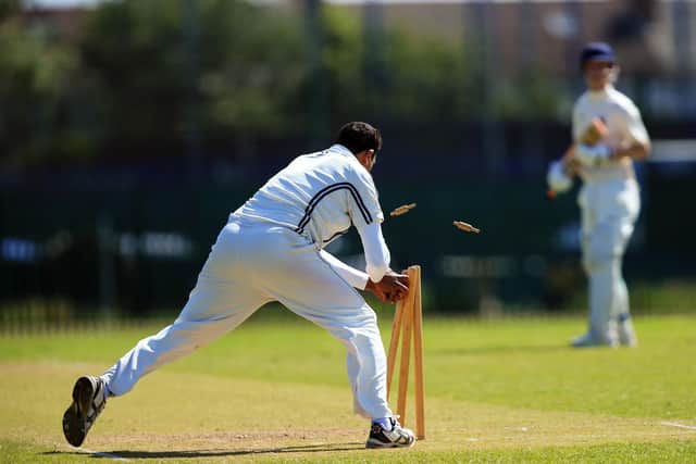 Kerala's Jubin Karippai runs out a Fareham & Crofton 2nds batsman. 
Picture: Chris Moorhouse