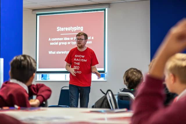 Presenter Paul Hill leads the children through the event. Picture: Mike Cooter (011121)